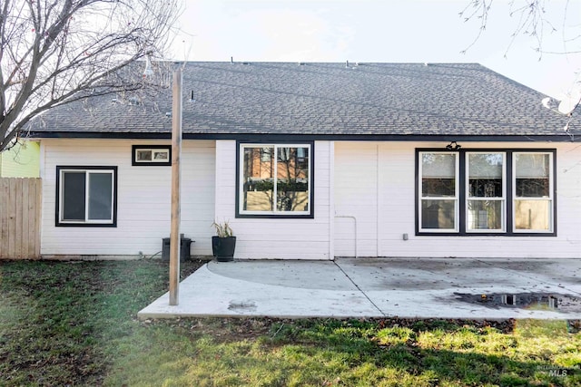 rear view of property featuring a patio