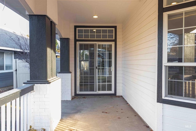 doorway to property featuring covered porch