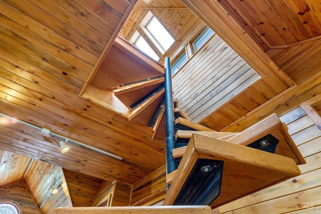 room details featuring track lighting and wooden ceiling