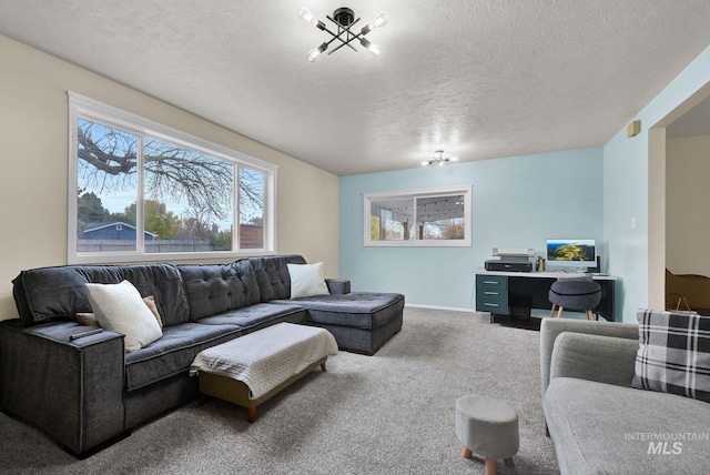 carpeted living room featuring a textured ceiling