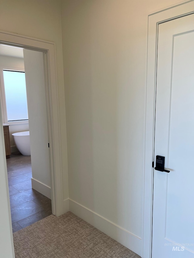 3075 N Costa Madera Ave, Star, ID 83669 - corridor with baseboards and carpet