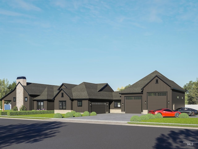 view of front of house with an attached garage, board and batten siding, roof with shingles, and a chimney