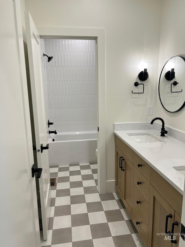 3075 N Costa Madera Ave, Star, ID 83669 - bathroom with double vanity, tile patterned floors, toilet, and shower / tub combination