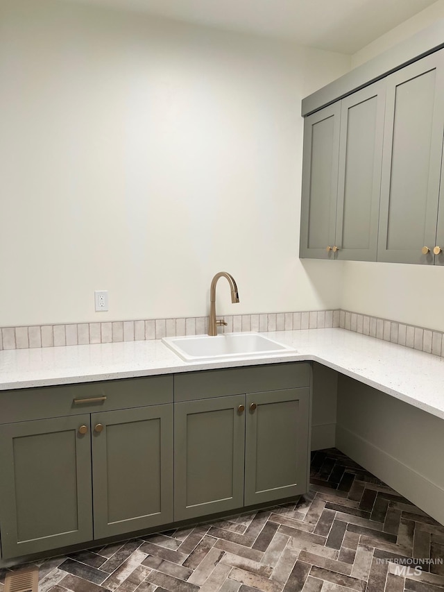 3075 N Costa Madera Ave, Star, ID 83669 - washroom featuring a sink and brick patterned flooring