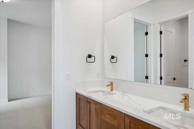 5351 W Mcnair St, Meridian, ID 83646 - bathroom with double vanity and baseboards