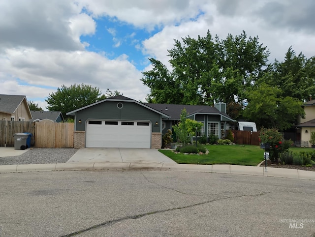 view of front of house with brick siding, driveway, and an attached garage