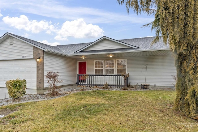 ranch-style home featuring a porch, a front lawn, brick siding, and an attached garage