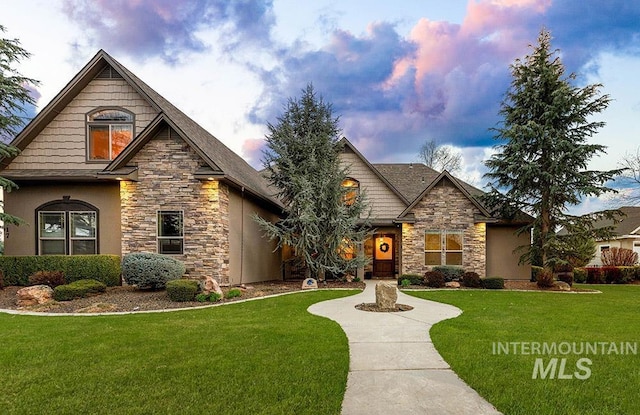 2817 W Chartwell Dr, Eagle, ID 83616 - craftsman-style house with stucco siding, stone siding, and a front yard