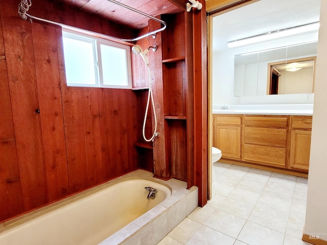 full bathroom featuring vanity, toilet, and tile patterned floors