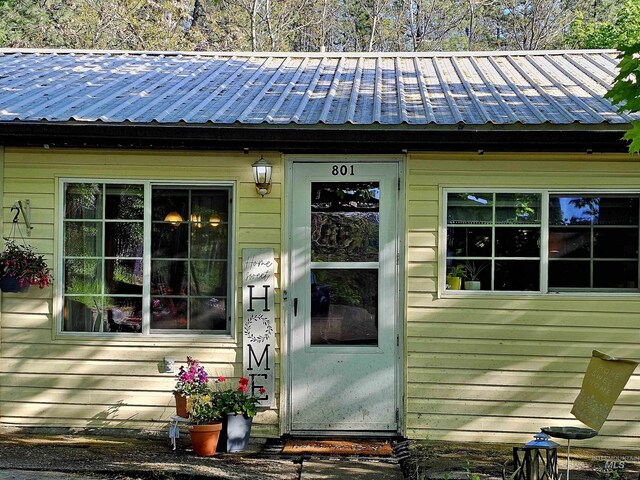 entrance to property with metal roof