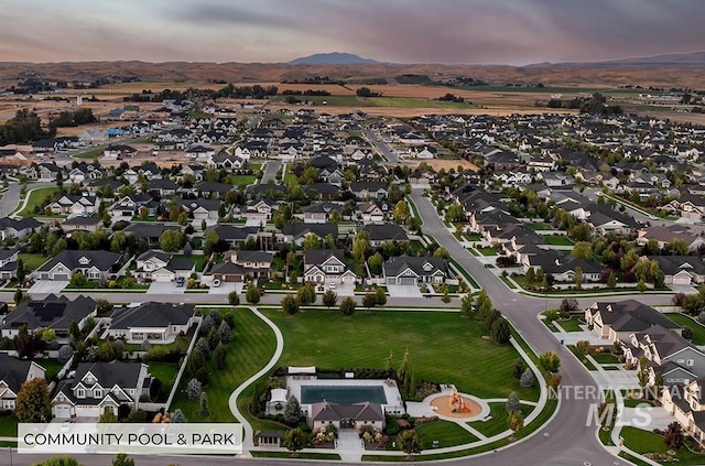 birds eye view of property featuring a residential view and a mountain view