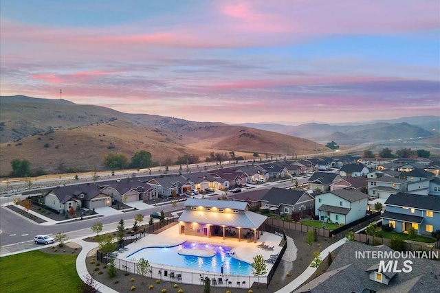 bird's eye view with a mountain view and a residential view