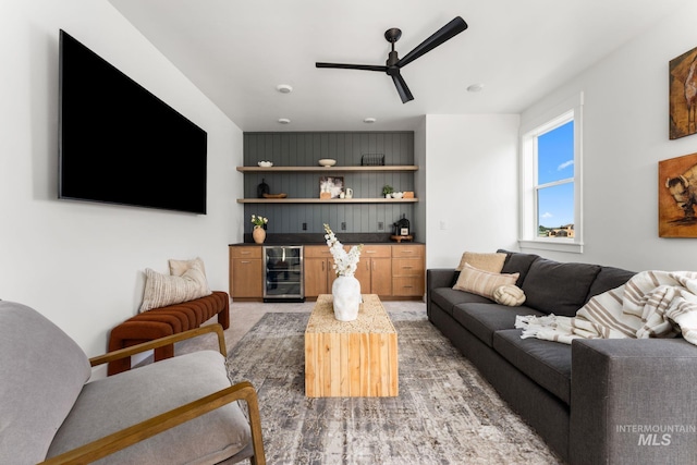 461 S Quincannon Ln, Star, ID 83669 - living room with beverage cooler, a ceiling fan, and a bar