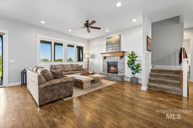 9968 Moon Shadow Ct, Middleton, ID 83644 - living area featuring hardwood / wood-style flooring, a ceiling fan, stairs, a stone fireplace, and recessed lighting