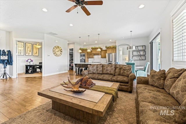 9968 Moon Shadow Ct, Middleton, ID 83644 - living room featuring light wood-style floors, ceiling fan, and recessed lighting