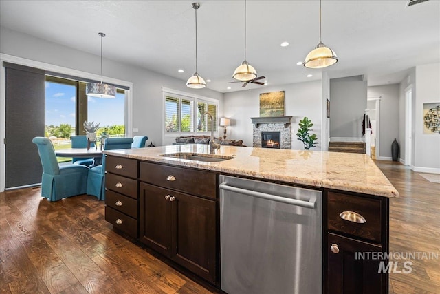 9968 Moon Shadow Ct, Middleton, ID 83644 - kitchen with dishwasher, dark wood-type flooring, dark brown cabinets, open floor plan, and recessed lighting