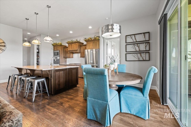 9968 Moon Shadow Ct, Middleton, ID 83644 - dining room with dark wood finished floors and recessed lighting