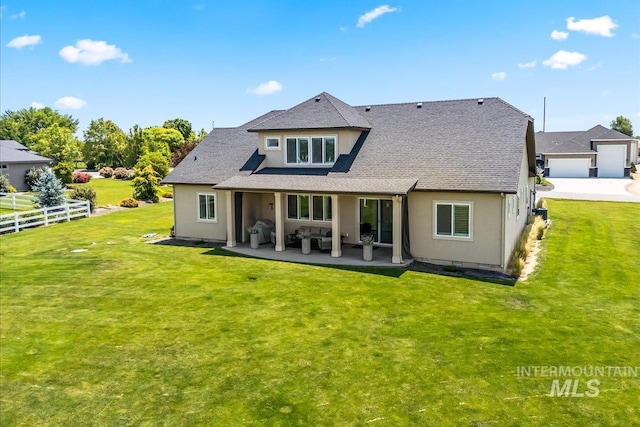 9968 Moon Shadow Ct, Middleton, ID 83644 - back of house featuring stucco siding, a shingled roof, and a patio
