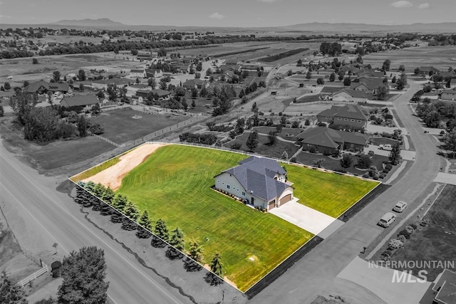 9968 Moon Shadow Ct, Middleton, ID 83644 - aerial perspective of suburban area featuring a mountain backdrop and property parcel outlined