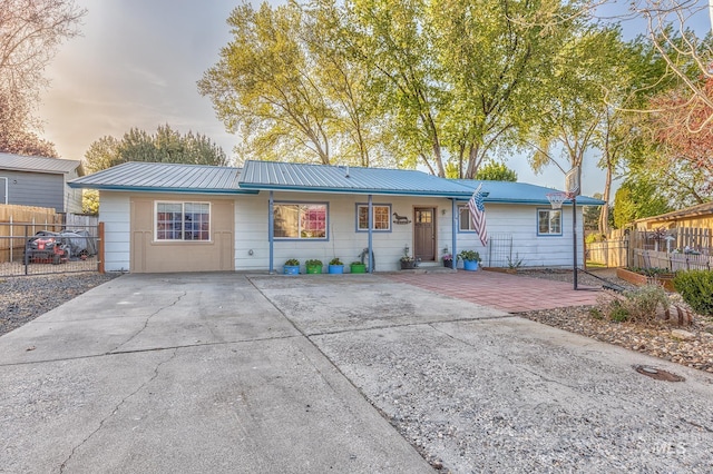 455 Farber Dr, Payette, ID 83661 - ranch-style home with fence, metal roof, and driveway