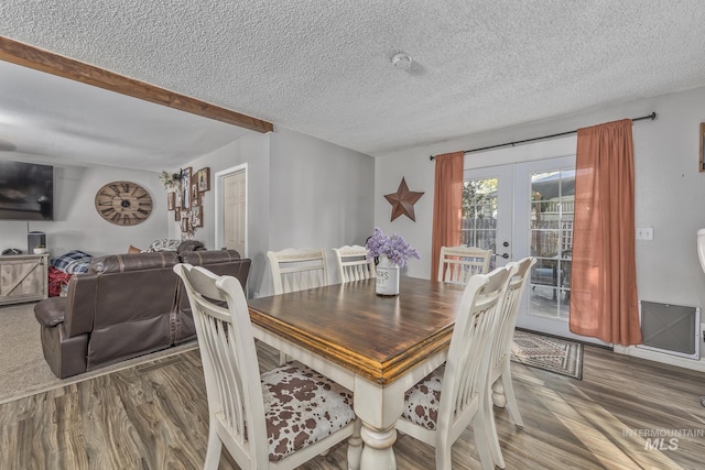 455 Farber Dr, Payette, ID 83661 - dining area with french doors, a textured ceiling, and wood finished floors