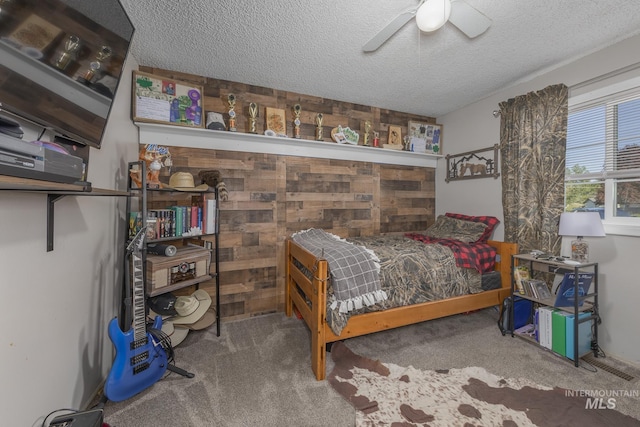 455 Farber Dr, Payette, ID 83661 - bedroom featuring carpet floors, ceiling fan, and a textured ceiling