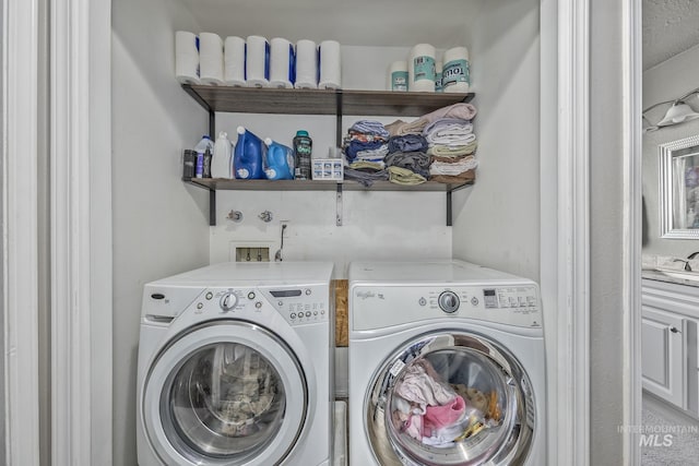 455 Farber Dr, Payette, ID 83661 - clothes washing area featuring a sink, laundry area, and washer and dryer