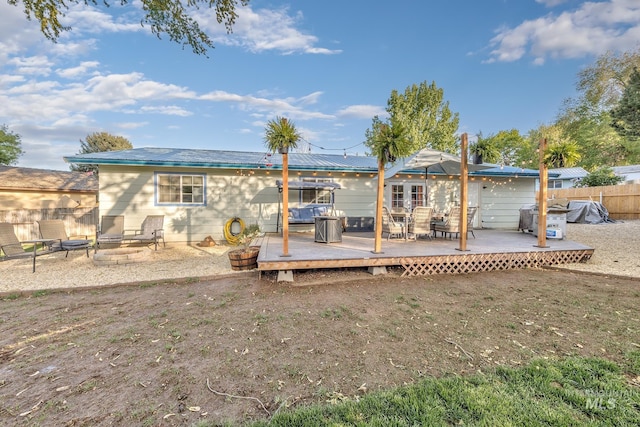 455 Farber Dr, Payette, ID 83661 - back of house with a fire pit, fence, and a wooden deck