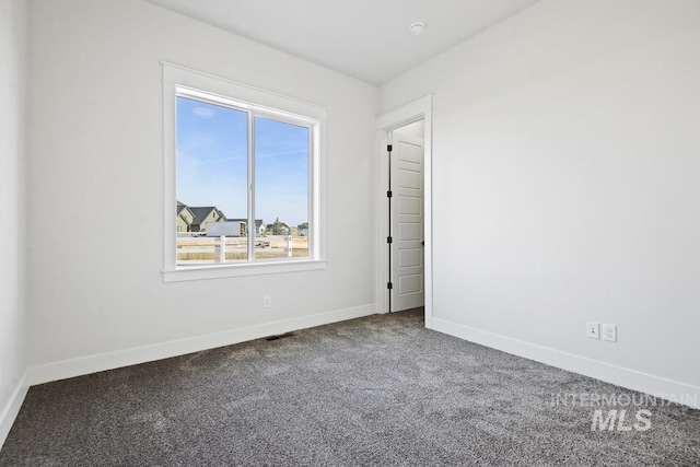 9382 Basin Kid, Middleton, ID 83644 - carpeted spare room with baseboards and visible vents