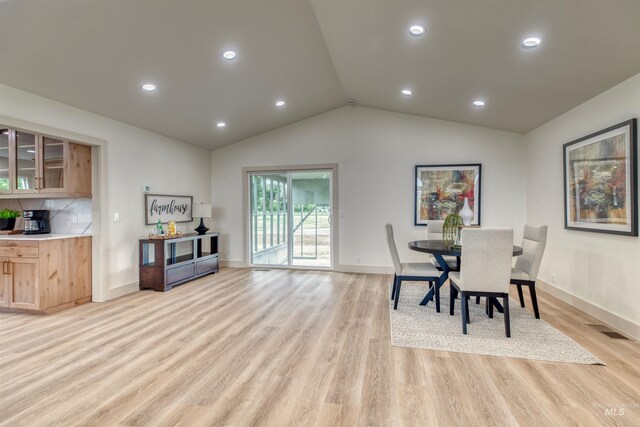 3131 Fuller Rd, Emmett, ID 83617 - dining area with light wood-type flooring, vaulted ceiling, baseboards, and recessed lighting