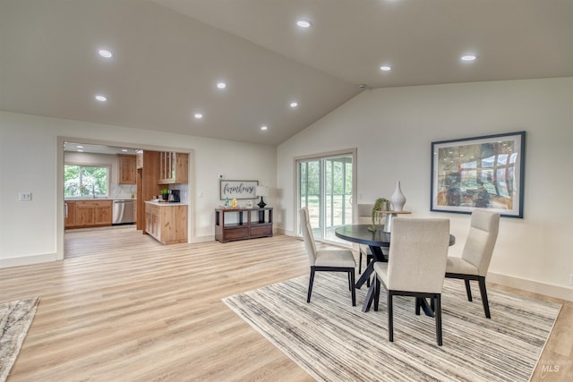 3131 Fuller Rd, Emmett, ID 83617 - dining area featuring light wood finished floors, plenty of natural light, recessed lighting, vaulted ceiling, and baseboards