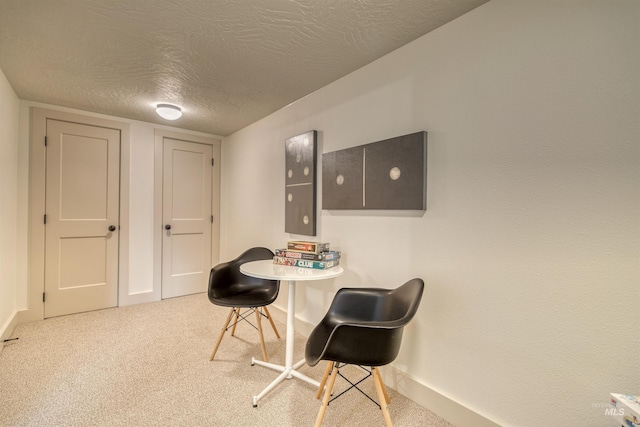 3131 Fuller Rd, Emmett, ID 83617 - carpeted dining space with baseboards and a textured ceiling