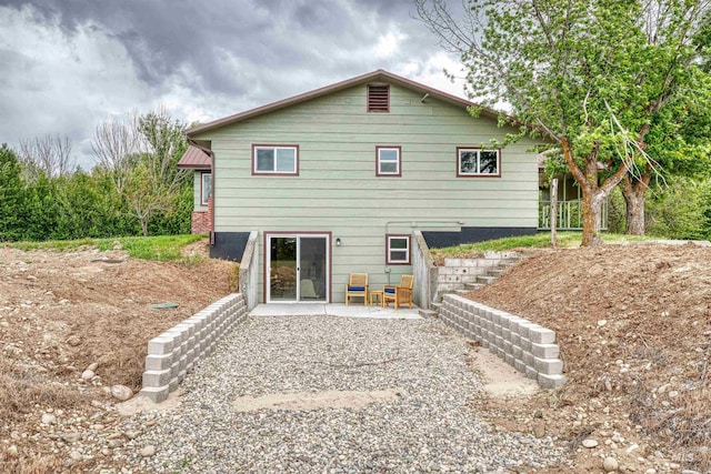 3131 Fuller Rd, Emmett, ID 83617 - rear view of house featuring a patio area and stairs