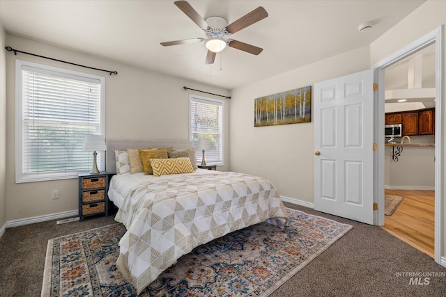 3011 S Montego Way, Nampa, ID 83686 - bedroom with carpet, baseboards, and a ceiling fan