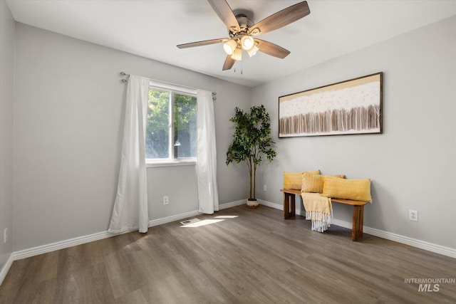 3011 S Montego Way, Nampa, ID 83686 - unfurnished room with wood finished floors, ceiling fan, and baseboards