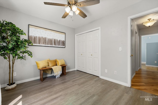 3011 S Montego Way, Nampa, ID 83686 - sitting room with wood finished floors, baseboards, and a ceiling fan