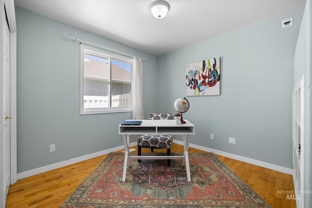3011 S Montego Way, Nampa, ID 83686 - office area featuring wood finished floors and baseboards