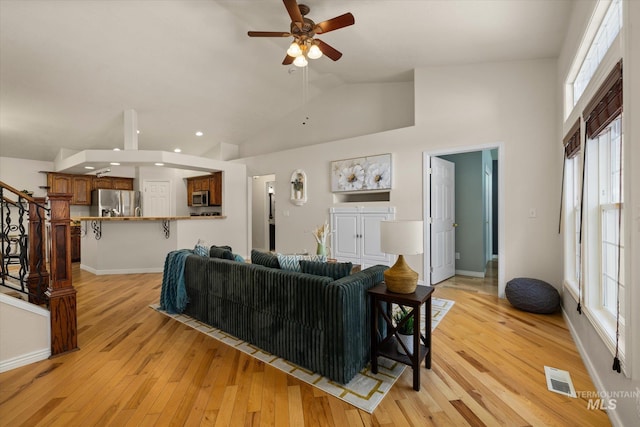 3011 S Montego Way, Nampa, ID 83686 - living area featuring ceiling fan, stairway, light wood-style floors, recessed lighting, and baseboards