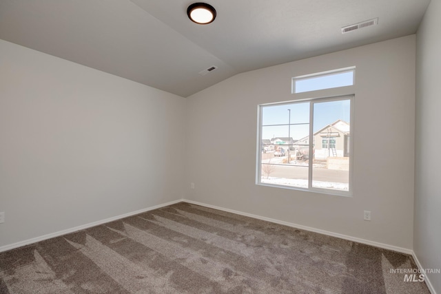 1457 W Bass River Dr, Meridian, ID 83642 - spare room with carpet flooring, lofted ceiling, and baseboards