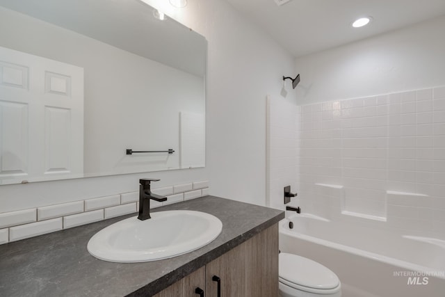 1457 W Bass River Dr, Meridian, ID 83642 - full bath with toilet, vanity, bathing tub / shower combination, and backsplash