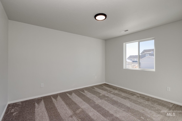 1457 W Bass River Dr, Meridian, ID 83642 - empty room featuring carpet flooring and baseboards