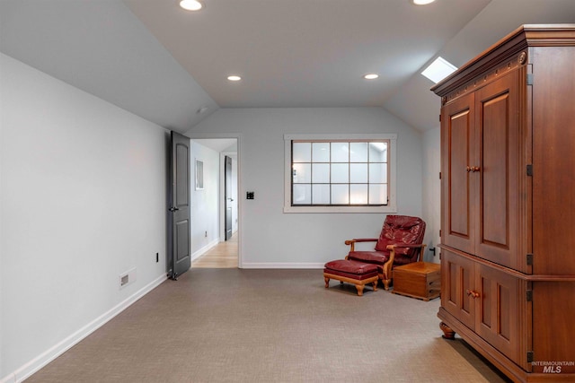 living area featuring recessed lighting, carpet, baseboards, and lofted ceiling