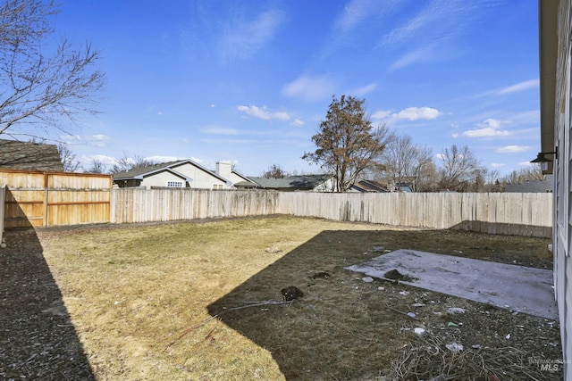 view of yard featuring a fenced backyard