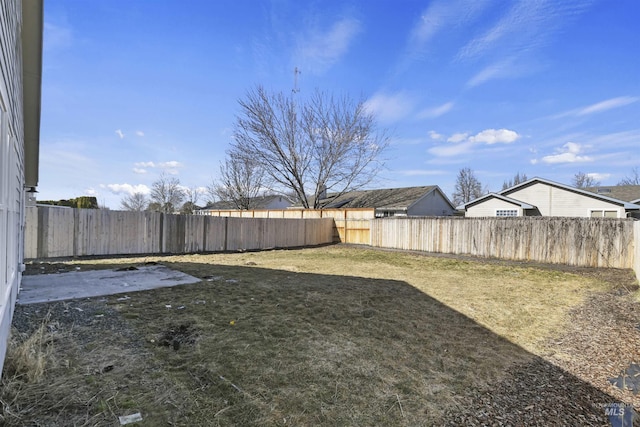 view of yard featuring a fenced backyard