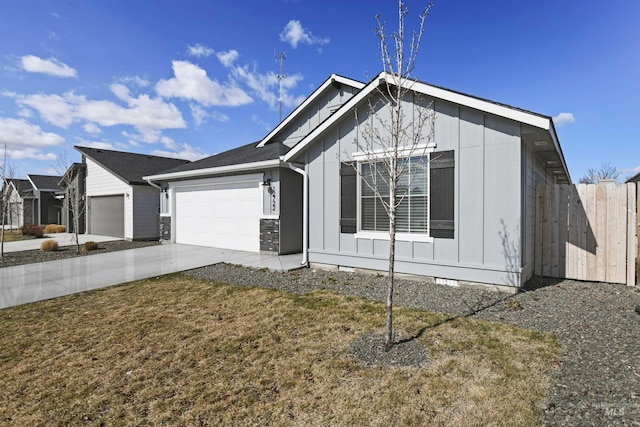 single story home featuring board and batten siding, driveway, a garage, and fence