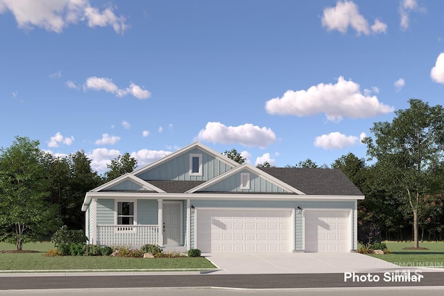 view of front of property featuring a garage, driveway, and covered porch
