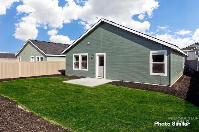 back of house featuring a patio area