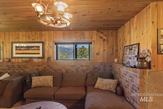 114 Par Dr, Cascade, ID 83611 - living area with wood ceiling, a chandelier, and wooden walls