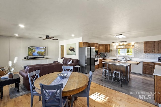 114 Par Dr, Cascade, ID 83611 - dining room with light wood-style floors, recessed lighting, and ceiling fan