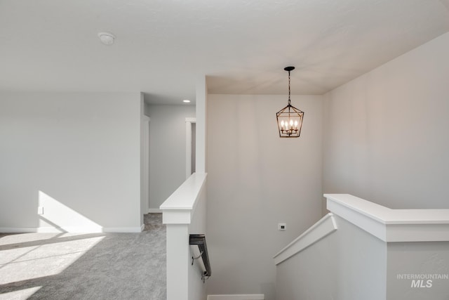 19361 James Ave, Caldwell, ID 83605 - staircase with a chandelier, baseboards, and carpet floors